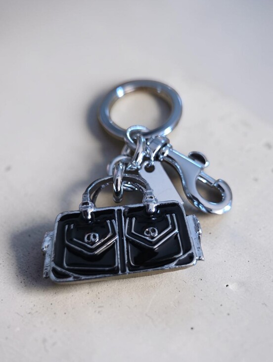 Sassified Boutique Other - Sassified Boutique Nwt Black and Silver Bag Charm Keychain